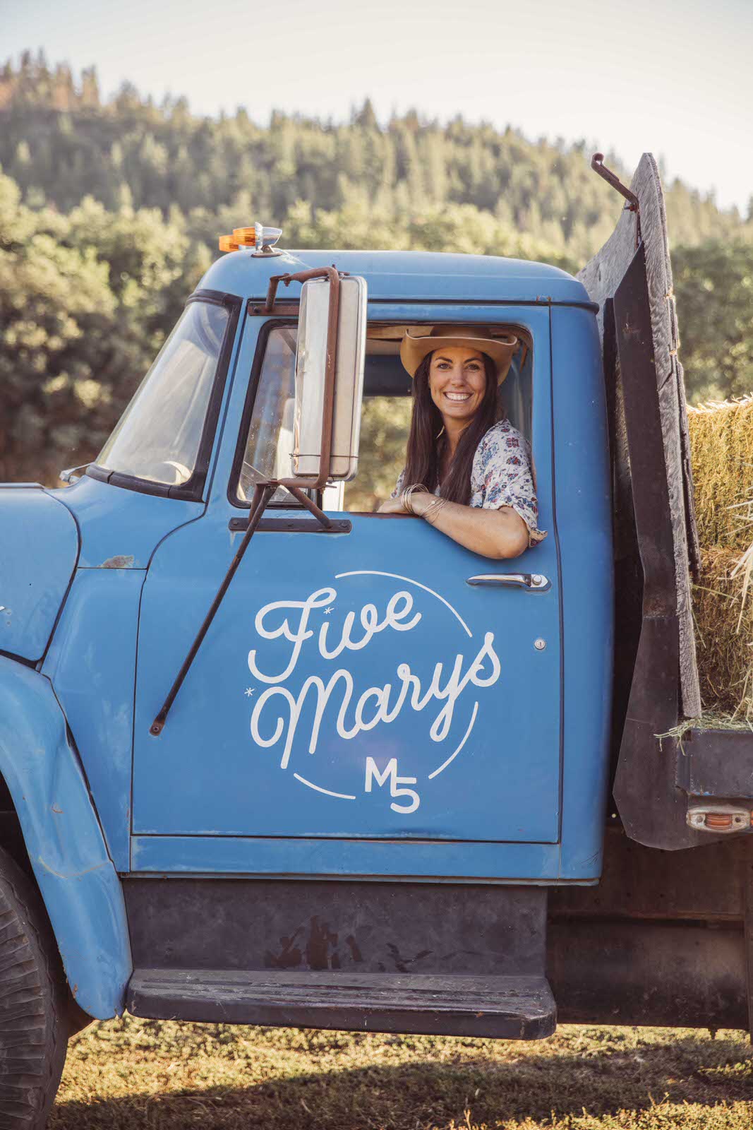 Mary Heffernan of Five Marys Farms in the Blue Feed Truck